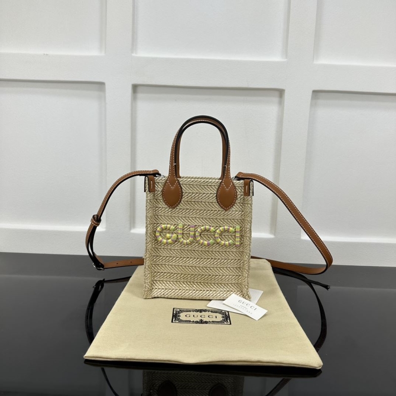 G*u*i top handle bags